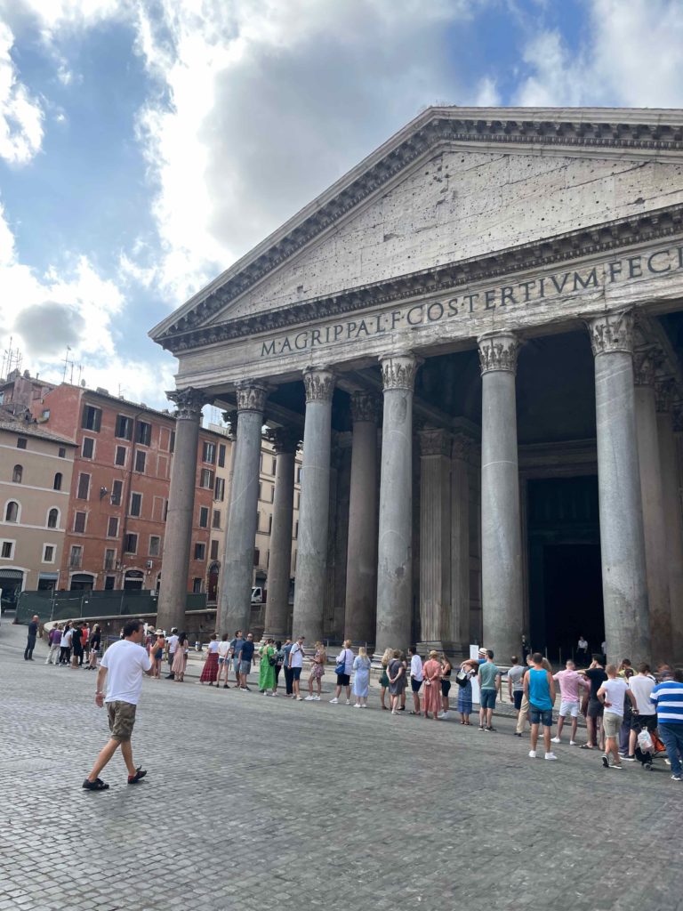 a group of people outside of Pantheon, Rome