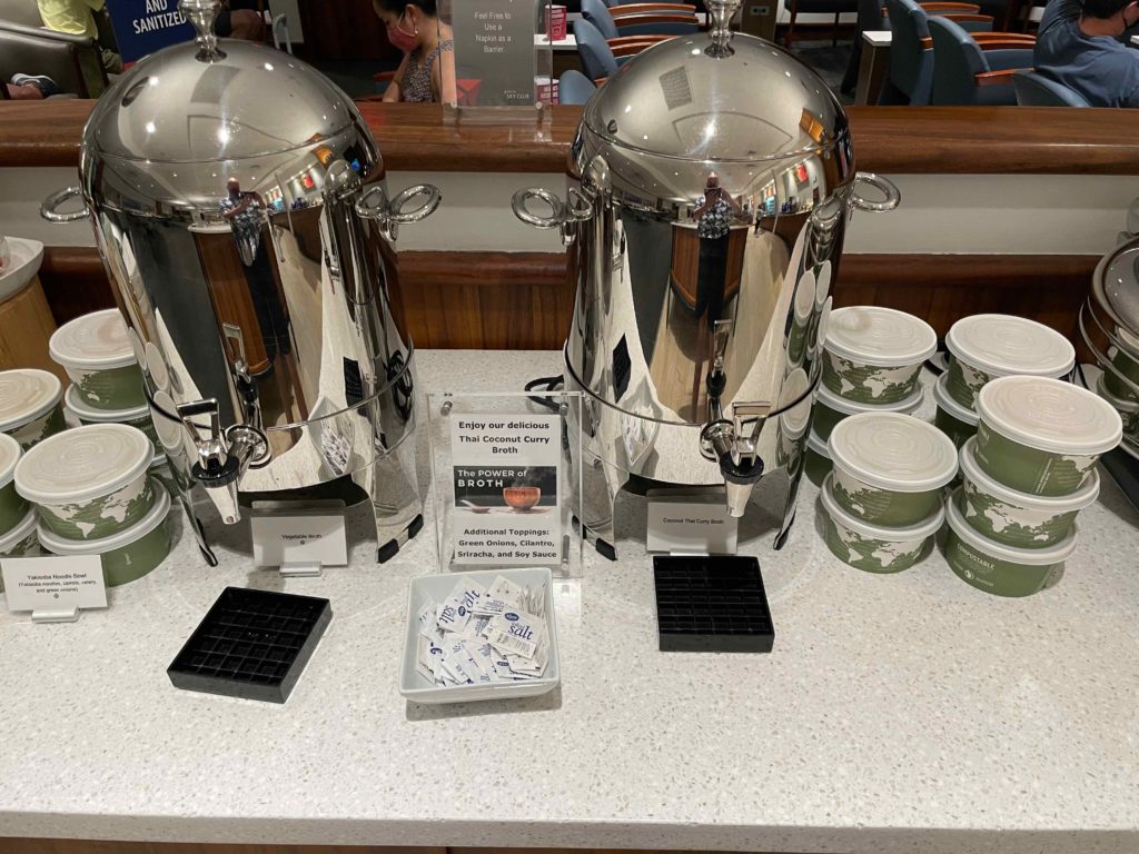 a group of coffee containers on a table