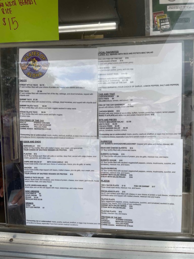 a menu on a glass case