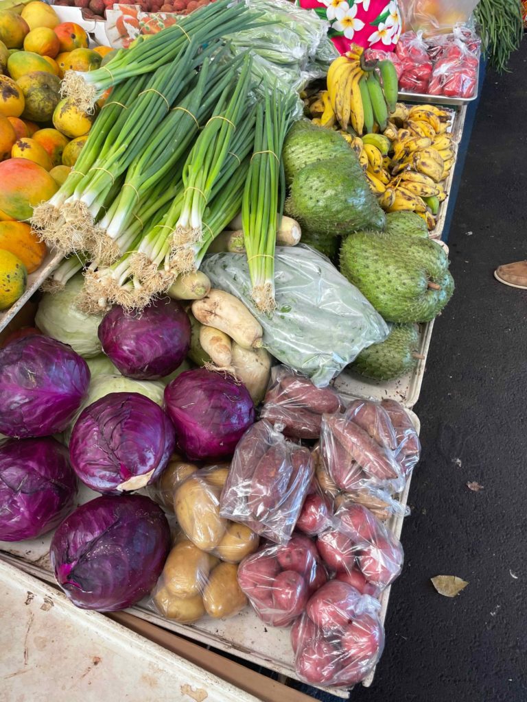 a group of vegetables and fruits on a table