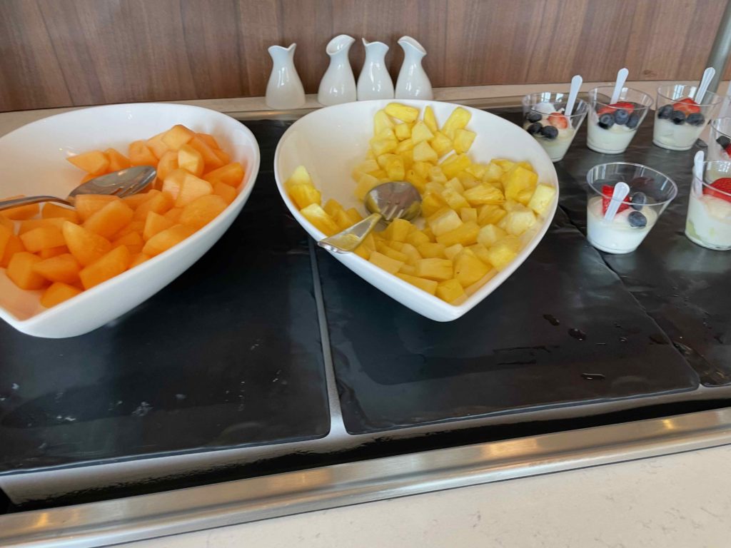 a bowl of fruit and yogurt in bowls