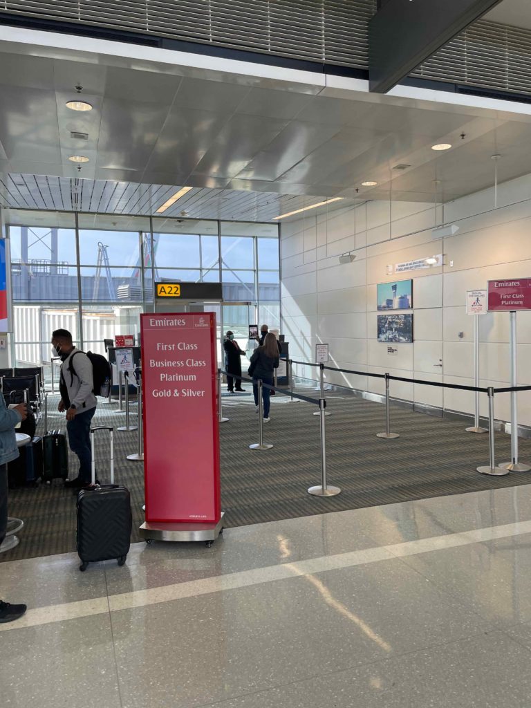 people in an airport with luggage